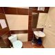 Санузел студии 52 м² с умывальником, зеркалом и унитазом в ЖК Villa Aria, Солнечный берег