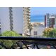 Морской пейзаж с балкона студии Barcelo Royal Beach — пляж и море между зданиями