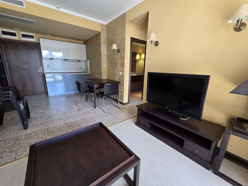 Гостиная с кухней и обеденной зоной в квартире Barcelo Royal Beach